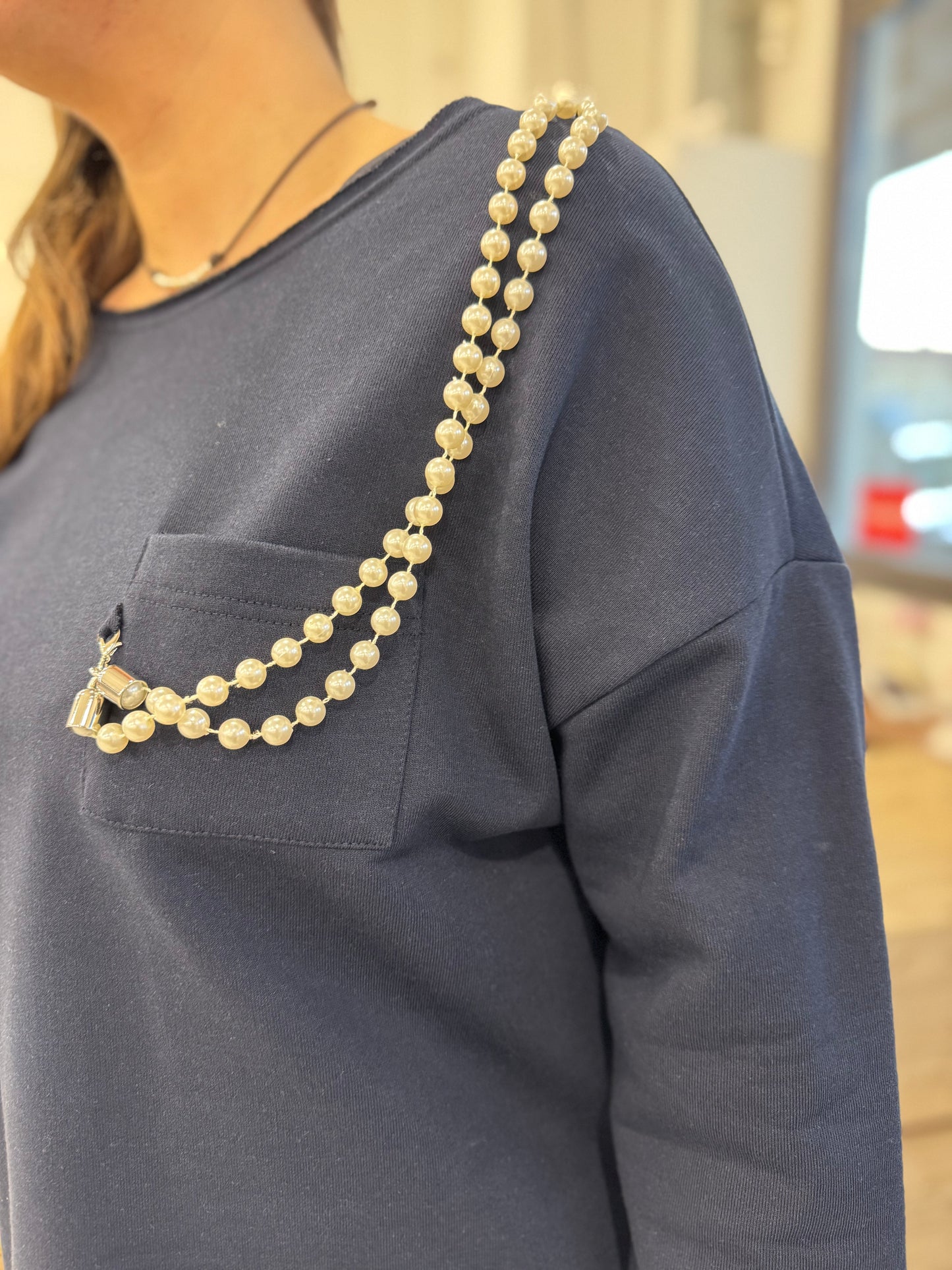 Felpa con accessorio over